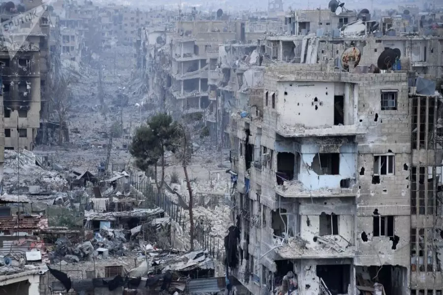سكان مخيم اليرموك يطالبون بالعودة إلى منازلهم وقوات الأسد تمنعهم