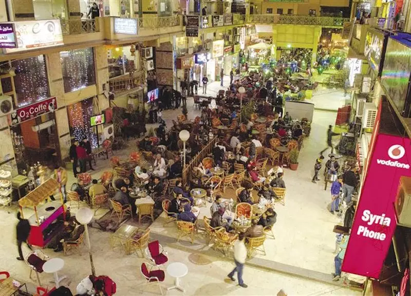 السوريون يزرعون الحيوية في مدينة "٦ أكتوبر" في القاهرة و يصبغون أحد أحياءه بطابعهم