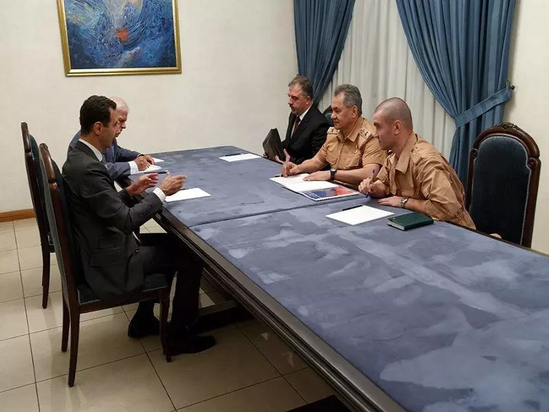 النظام مخفورًا إلى حميميم