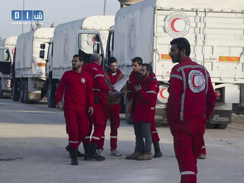 دخول  شاحنات المساعدات لمضايا وقوات الأسد تطلق النار على البلدة بالتزامن مع دخولها