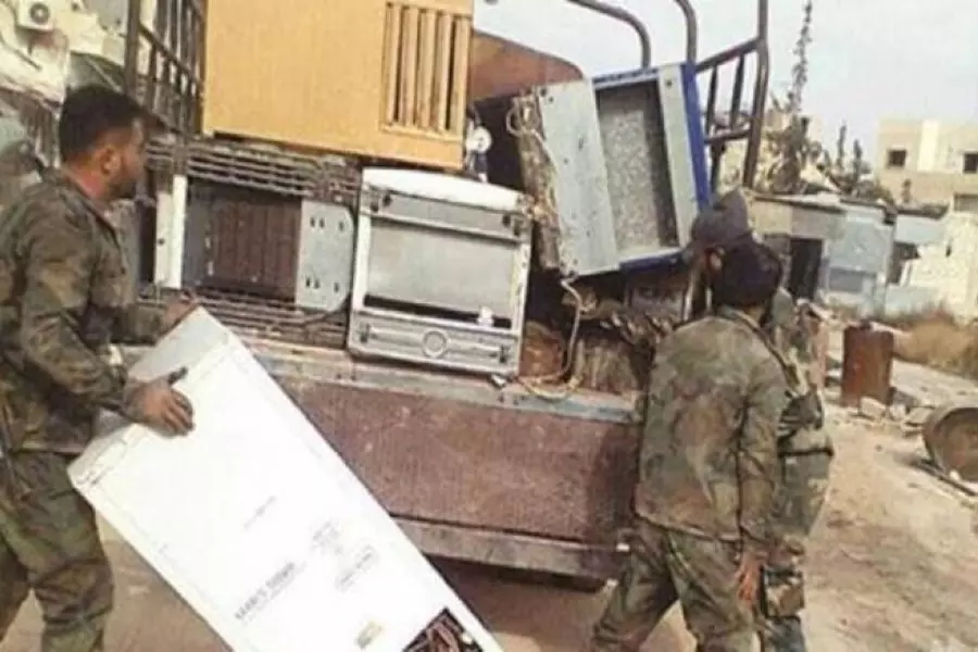 جرجى باقتتال بين ميليشيات النظام بدير الزور والسبب خلافات على "التعفيش"