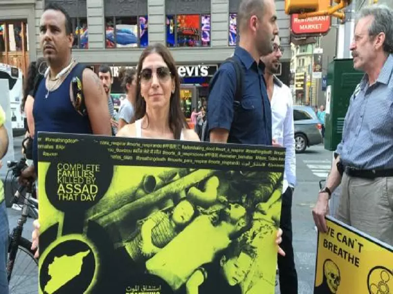نيويورك ... إضاءة شموع و توزيع منشورات على المارة في الذكرى الثانية لـ "مجزرة الغوطة"
