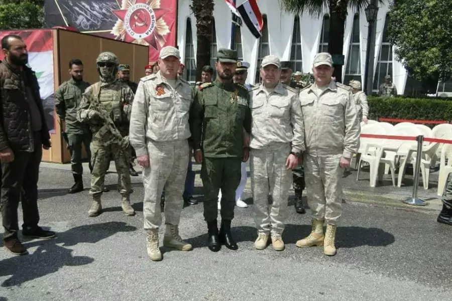رجل روسيا "سهيل الحسن" يُكرم في حميميم بعيد النصر الروسي والأسد مغيب في سراديب دمشق