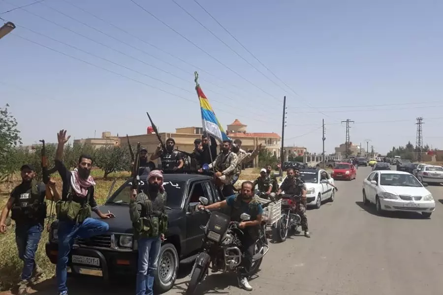 فصائل بالسويداء تحتجز ضباط وعناصر للنظام وتبادلهم بامرأة اعتقلتها مخابراته بدمشق