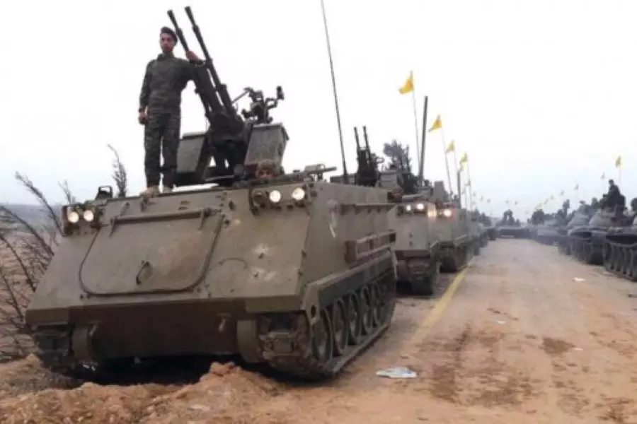 استعراض روسي «حزب إلهي» على أطلال حمص