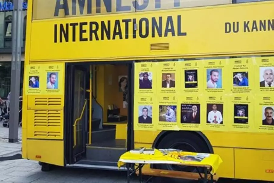 نشطاء أكراد يشاركون فعالية لـ "العفو الدولية " خاصة بالدفاع عن المعتقلين السياسيين