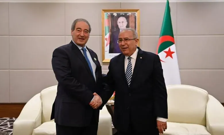وزير الخارجية الجزائري رمطان لعمامرة - وزير خارجية النظام فيصل المقداد