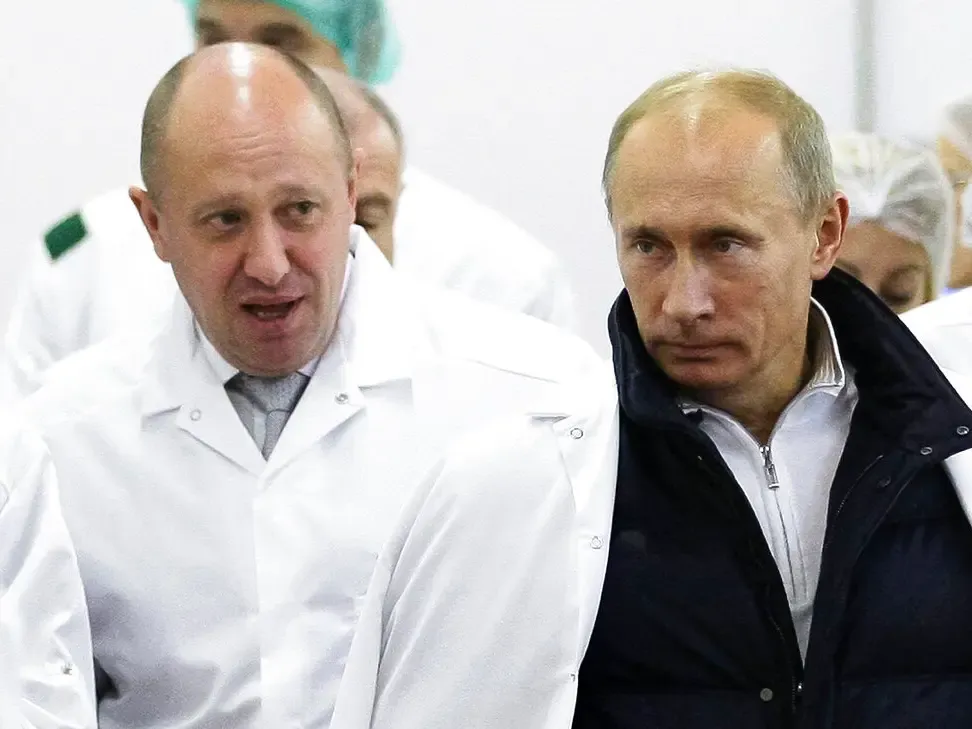 يفغيني بريغوجين مع  الرئيس الروسي فلاديمير بوتين