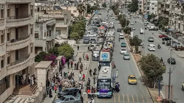 قافلة جديدة من مهجّري حمص تعود إلى المدينة قادمة من مخيم زوغرة