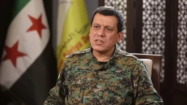 "عبدي" يرحب برفع العقوبات عن سوريا و"فيدان" يُطالب "قسد" بتفكيك "YPG"