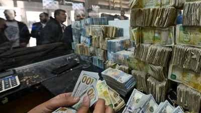 تراجع نسبي لليرة أمام الدولار وسط حركة تجارية نشطة وعودة تدريجية للتصدير في سوريا