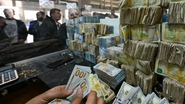 تراجع نسبي لليرة أمام الدولار وسط حركة تجارية نشطة وعودة تدريجية للتصدير في سوريا