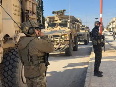 قوات أمريكية في مدينة ديرحافر يوم أمس الجمعة 