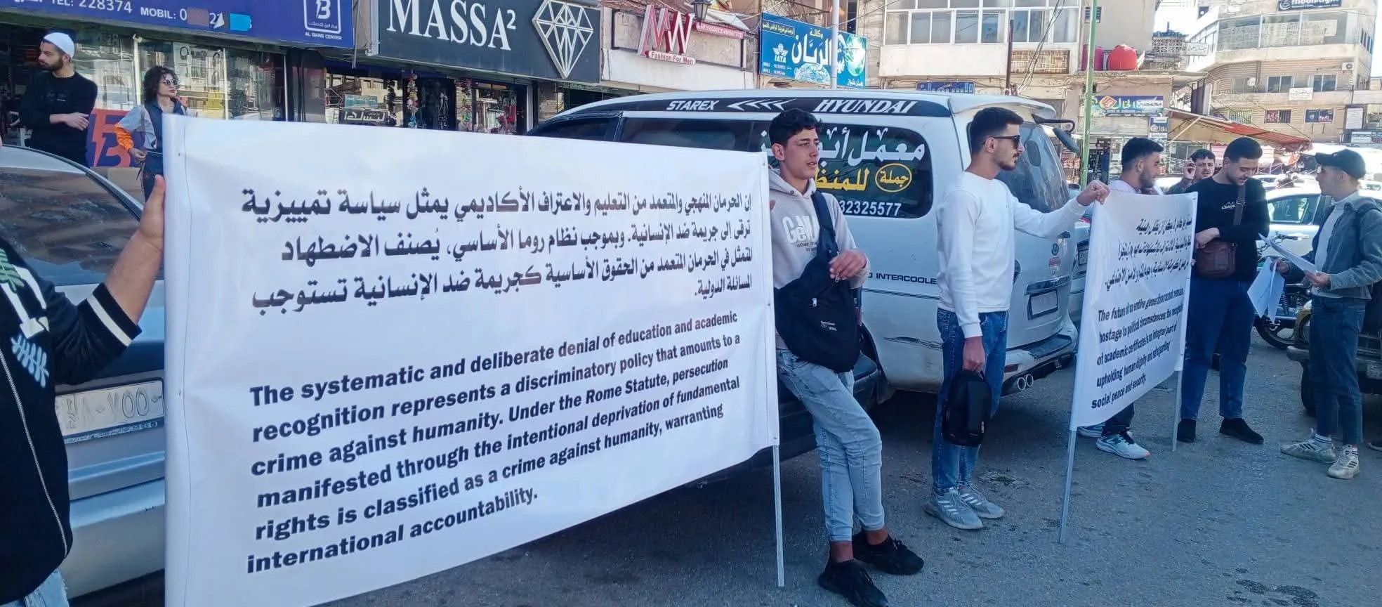 اقتحام ساحة الكرامة في السويداء وفض اعتصام طلابي بالقوة وفرض رموز طائفية