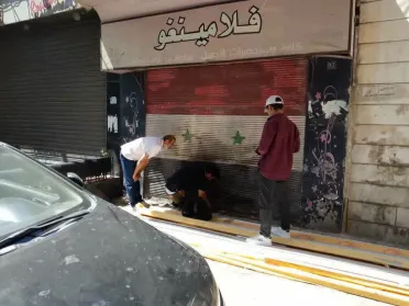 حملة رقابية في ساروجة بدمشق تغلق 27 محلاً ضمن إجراءات إزالة رموز النظام البائد